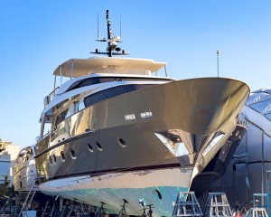 Luxury yacht on scaffolding's for maintenance at dry dock Luxury yacht on scaffolding's for maintenance at dry dock